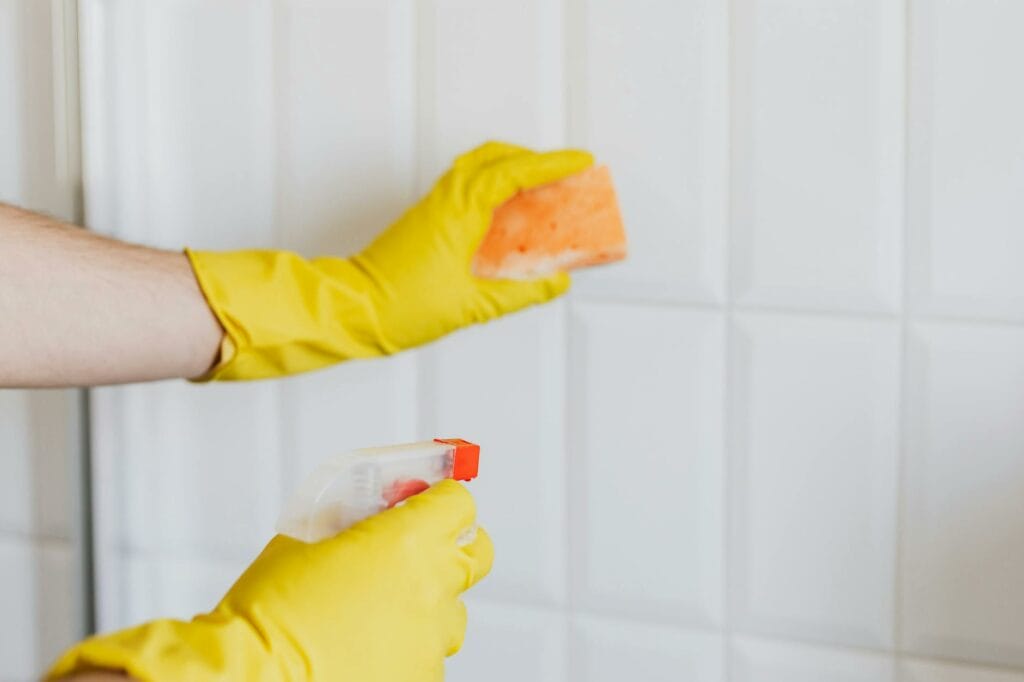 Professional bathroom tile cleaning service removing dirt and grime from ceramic tiles