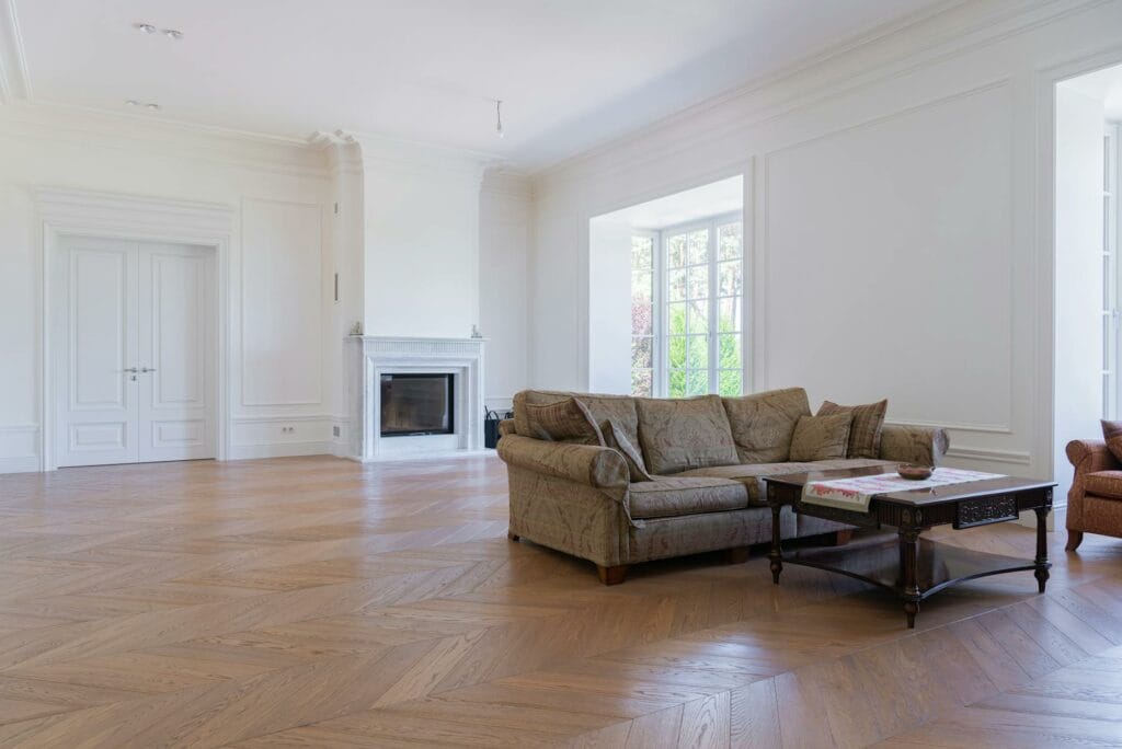 Professional hardwood floors cleaning service removing dirt and restoring natural wood shine